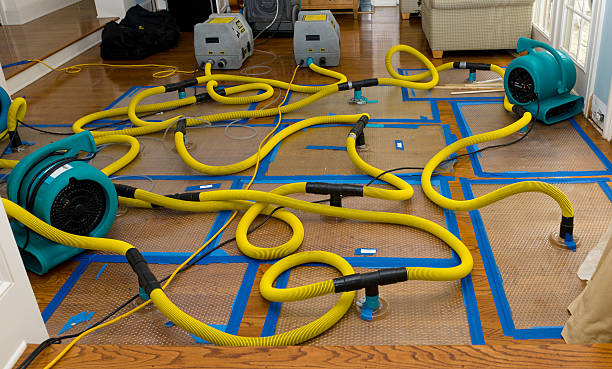 Professional Flood Damage Restoration technician working in Tiger, GA